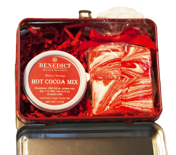 Image of homemade peppermint marshmallows and signature hot cocoa mix in a holiday lunchbox gift tin from Benedidict Treats